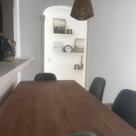 En 1 *